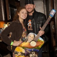 Stoney buys custom guitar to support RDRF!